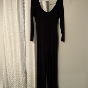 Fashion nova jumpsuit . Barely worn. Black ribbed
